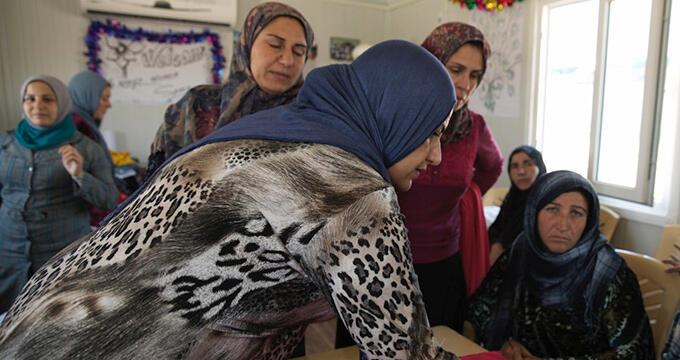 After flight from Syria, refugee women in Iraq find safety, support